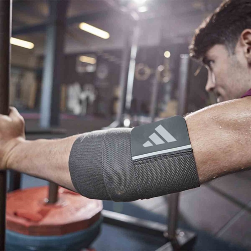 Adidas Universal Support Wrap - Lang på arm