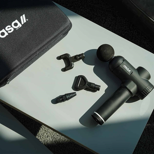 ASG Pro Massagepistol på bord