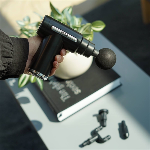 ASG Mini Massagepistol i hånd
