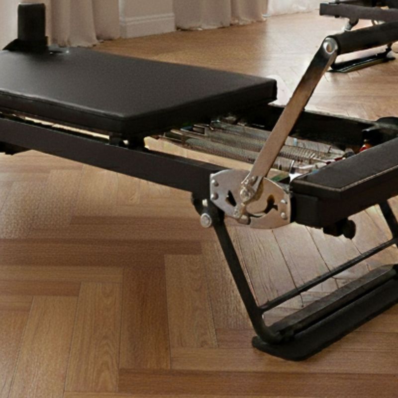 Reformer pilates maskine med fjedre til justerbar modstand